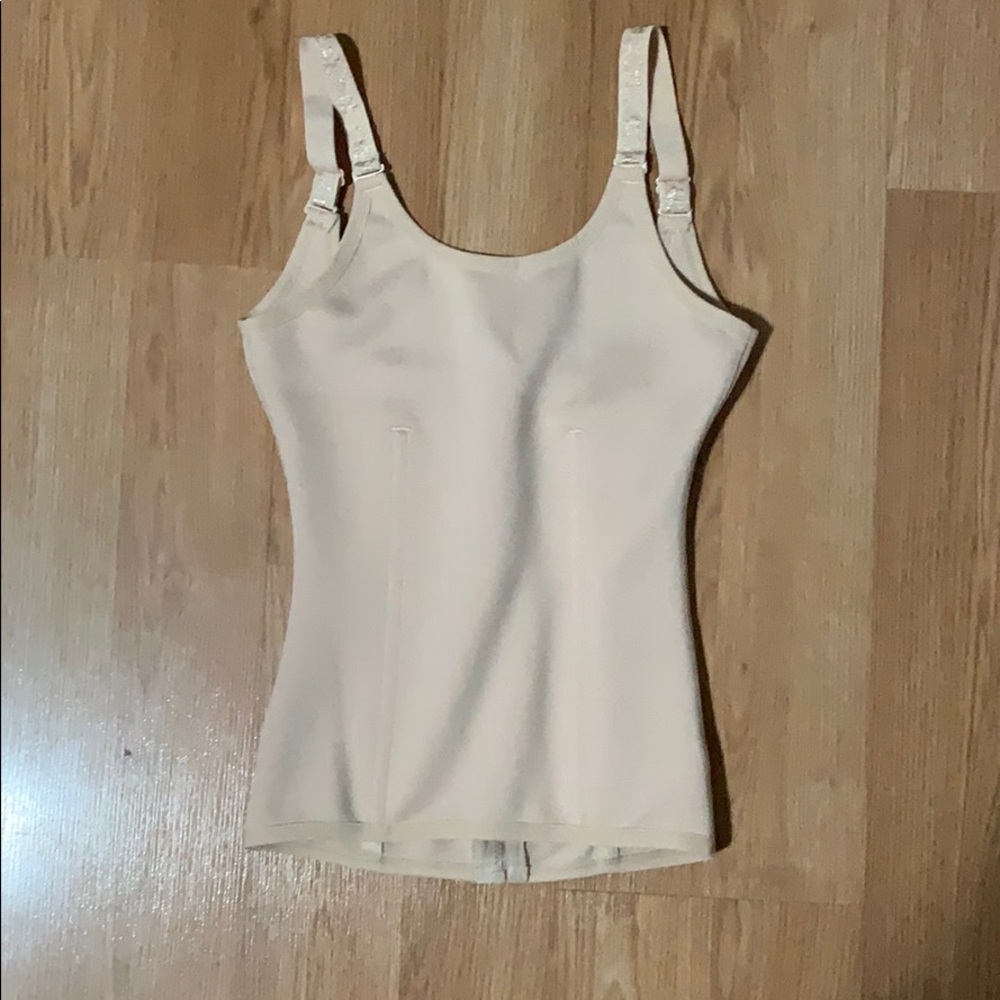 Nude colored shape wear/corsette. Size small.